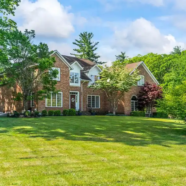 CUSTOM BRICK ESTATE WITH ADJACENT PRIVATE PARCEL