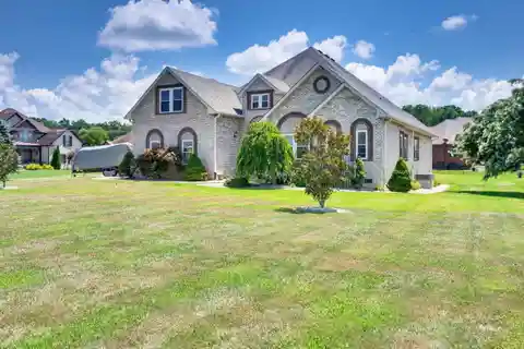 Meticulously Maintained All-Brick Corner Lot Home