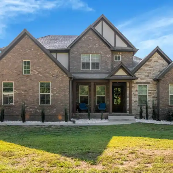 CUSTOM BEAUTY ON JUST UNDER THREE ACRES