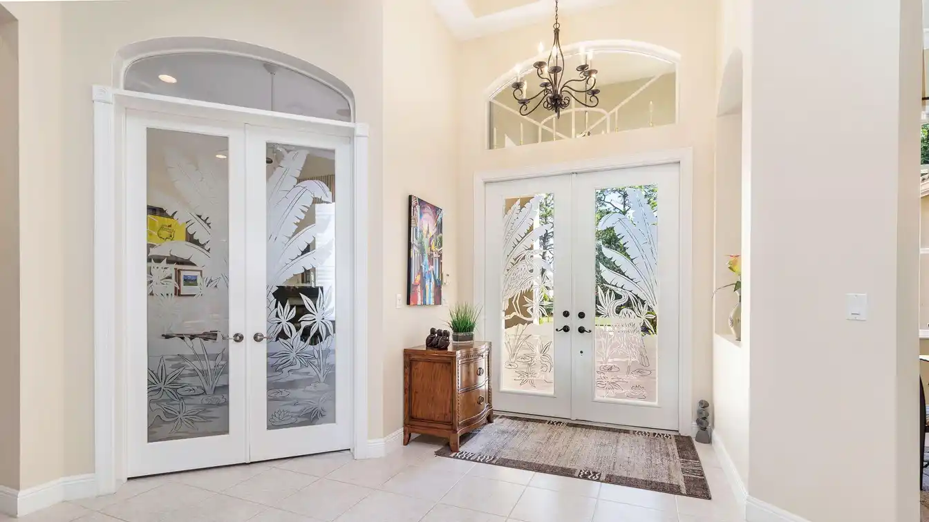Custom Home on a Lush Private Acre in Bay Hill Estates