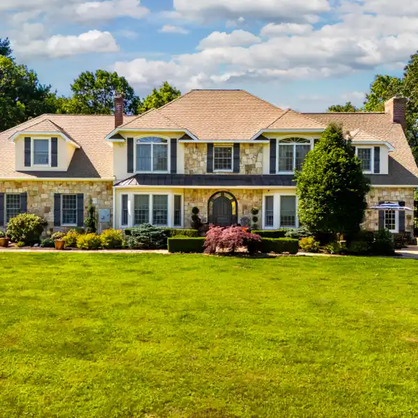 BEAUTIFULLY MAINTAINED HOME IN A SERENE SETTING