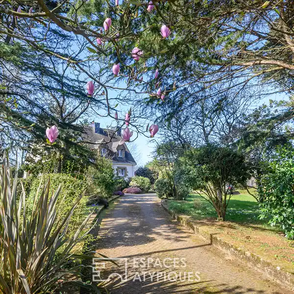 PEACEFUL LIVING ON EXPANSIVE WOODED LOT