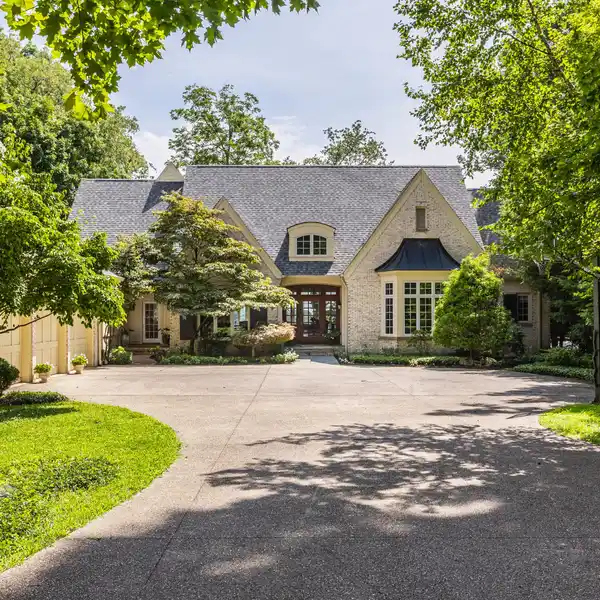 FRENCH COUNTRY-INSPIRED RESIDENCE ON 2.8 WOODED ACRES