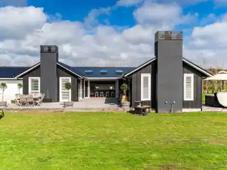 Curated Luxury with Vaulted Indoor-Outdoor Flow