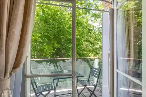 Finely Detailed Apartment with Leafy Surrounds