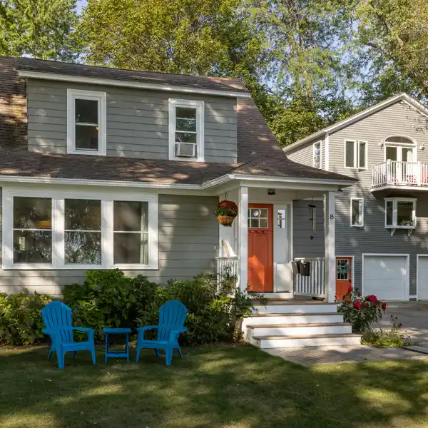SOARING CEILINGS AND WATER VIEWS IN A TRULY UNIQUE HOME
