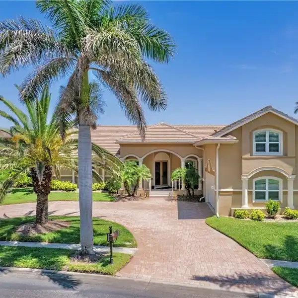 CUSTOM WATERFRONT HOME IN GATED CATALPA COVE