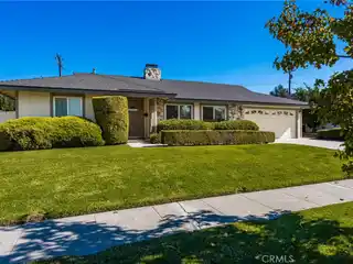 Charming Single-Story Home with Serene Plush Yard