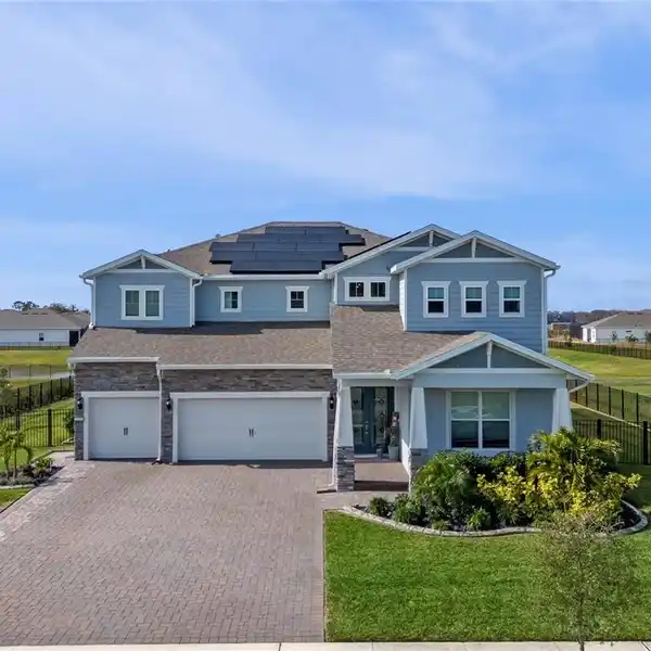 STUNNING HOME IN THE GATED LAKEFRONT COMMUNITY OF SUNSET PRESERVE