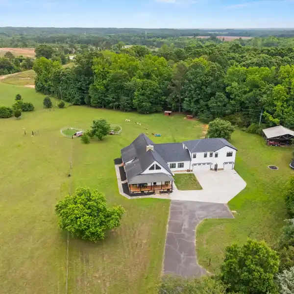 RUSTIC CHARM WITH MODERN LUXURY ON 18 ACRES