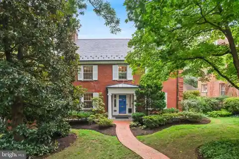 Stately Brick Colonial with Serene Backyard Retreat