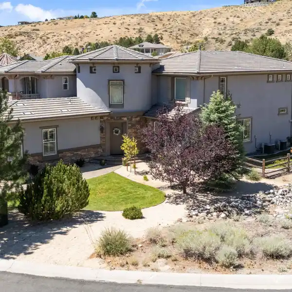 BEAUTIFULLY APPOINTED HOME ON A CORNER LOT