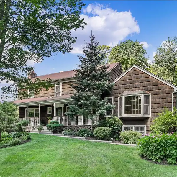 BEAUTIFUL COLONIAL ON NEARLY THREE PARK-LIKE ACRES