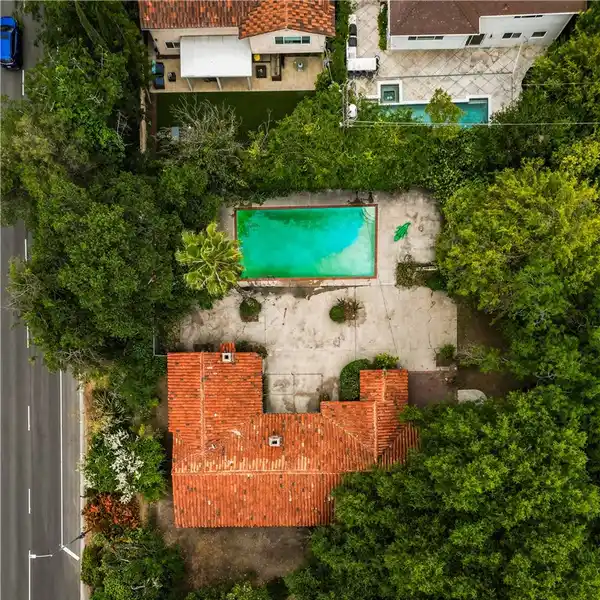 SPANISH HACIENDA ON AN OVERSIZED CORNER LOT