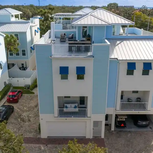 EXQUISITE COASTAL TOWNHOME WITH ROOFTOP TERRACE AND GULF VIEWS