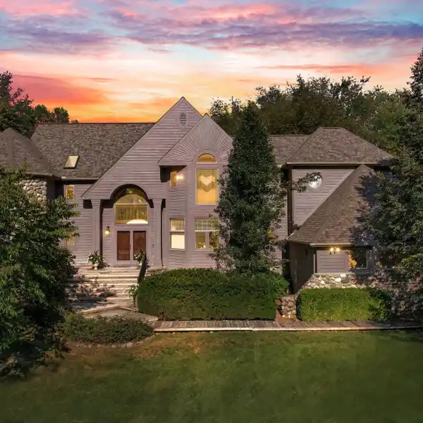 QUALITY-BUILT CONTEMPORARY ON 2.5 WOODED ACRES