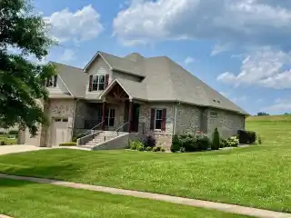 Custom Home in the Prestigious Olde Stone Golf Course Community