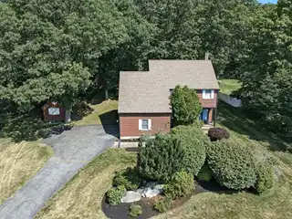 Meticulously Maintained and Improved Home in Coveted Squire's Glen