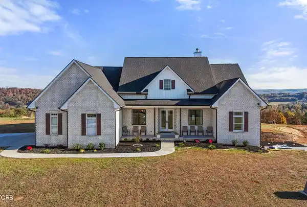 STUNNING CUSTOM BRICK RANCH OFFERING INCREDIBLE SUNRISES