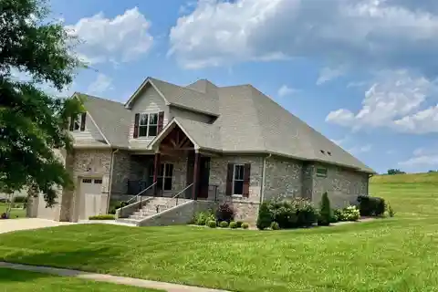 Custom Home in the Prestigious Olde Stone Golf Course Community