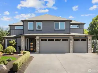 Stunning Estate Nestled on a Beautifully Landscaped Acre