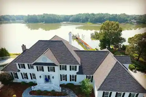 Spectacular Residence Privately Situated on Gated Peninsula Lot