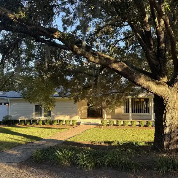 SOPHISTICATED LAKEFRONT LIVING WITH SUNLIT INTERIORS & SCENIC VIEWS