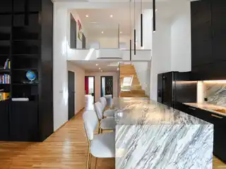 Sophisticated Duplex with Designer Finishes and Fireplace