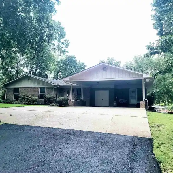 TRANQUIL LAKEFRONT GEM WITH ENDLESS POTENTIAL