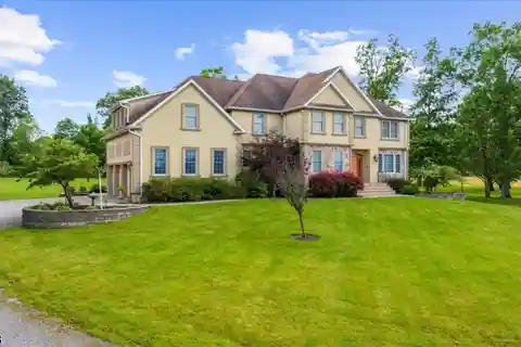 Pristine Custom Colonial Home on 18.8 Acres