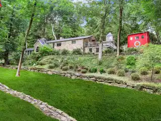 Exceptional Stone Home with Heated Barn