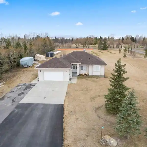 ACREAGE LIVING WITH FAIRWAY VIEWS AND TOWN CONVENIENCE