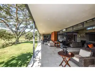 Dual-Home Masterpiece in Exclusive Estate Setting