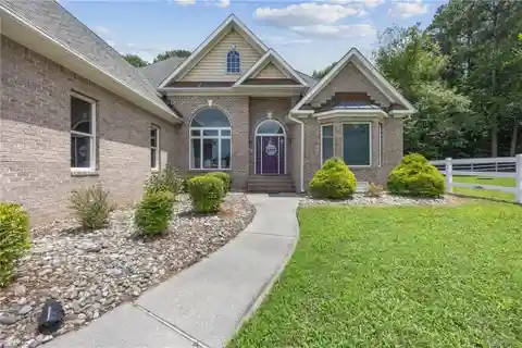 All-Brick Beauty Backing to Scenic Cypress Creek