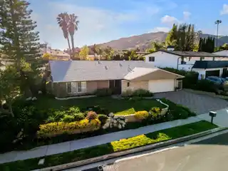 Private Saltwater Pool & Spa Home Surrounded by Lush Landscaping