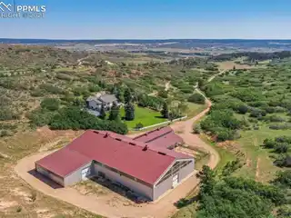 Sophisticated Ranch Home with Custom Arena and Barndominium