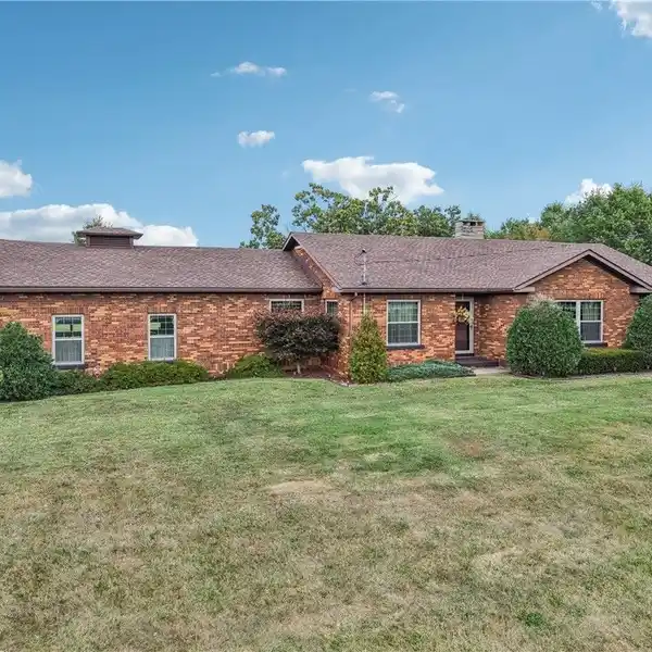 BEAUTIFUL BRICK RANCH ON 27-PLUS ACRES