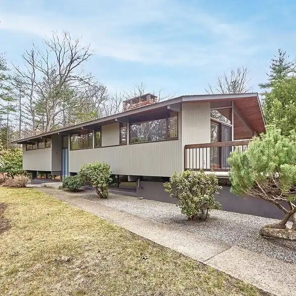 BEAUTIFULLY UPDATED AND METICULOUSLY MAINTAINED DECK HOUSE