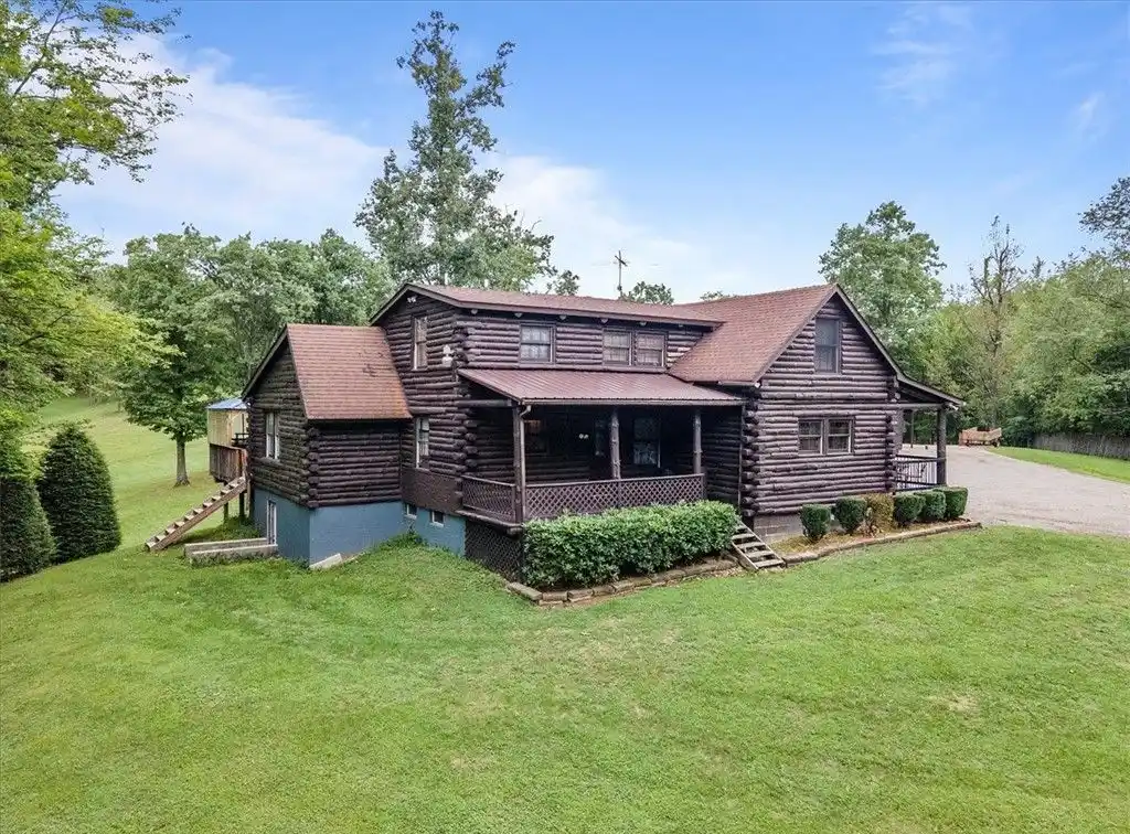 Charming Log Home on 24-plus Acres