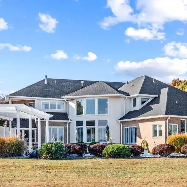 IMPRESSIVELY OPEN TWO-STORY HOME