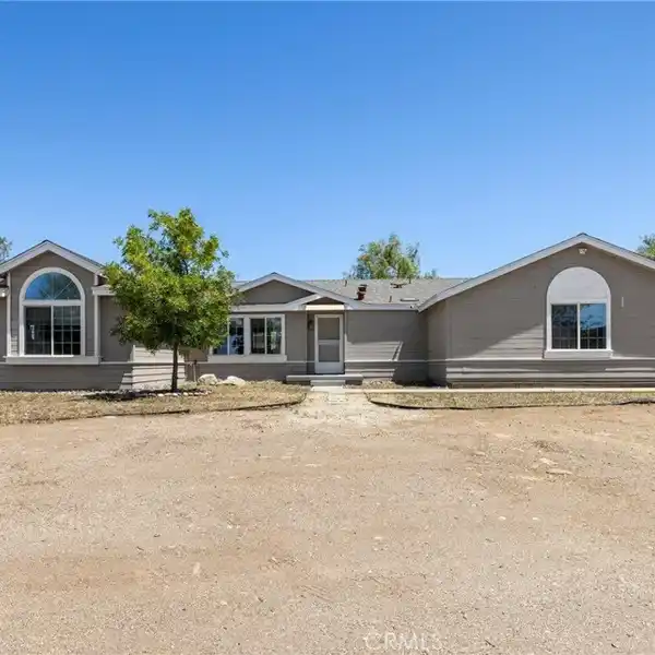 INCREDIBLE HOME AND FIVE-ACRE HORSE RANCH