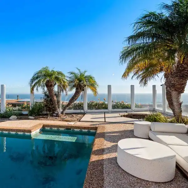 ICONIC MID-CENTURY MODERN WITH PANORAMIC PACIFIC VIEWS