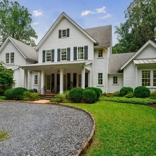 ONE-OF-A-KIND FARMHOUSE ON TWO ACRES