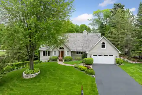 Meticulously Maintained Wayzata Home on a Serene, Private Lot