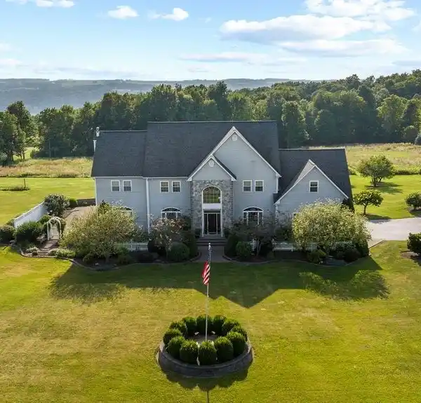 EXQUISITE COLONIAL ON OVER 12 ACRES