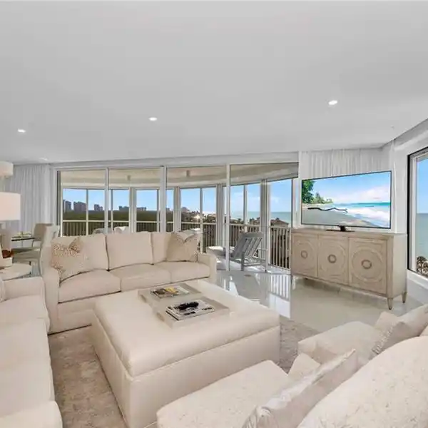 TRANSFORMED BEACHFRONT UNIT IN BAY COLONY