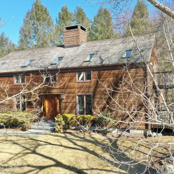 ONE-OF-A-KIND CUSTOM BUILT BARN HOME ON FIVE SECLUDED ACRES
