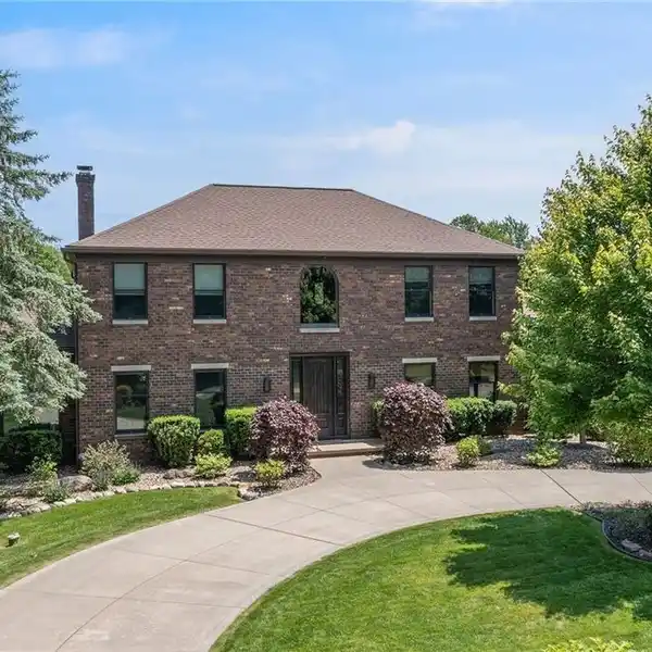 ONE-OF-A-KIND CUSTOM ALL-BRICK CENTER HALL COLONIAL