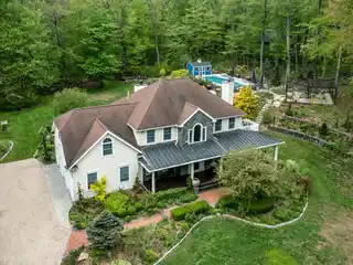 Colonial Home Surrounded by Nature