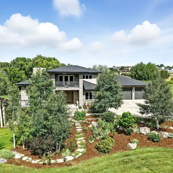 STUNNING ESTATE WITH PROFESSIONALLY LANDSCAPED GROUNDS